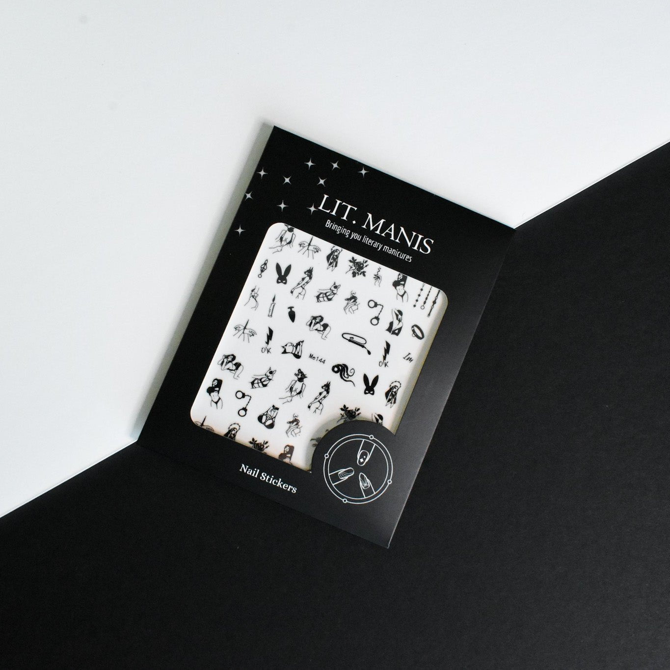 A package of self-adhesive nail art stickers with a black and white design, labeled 'Lit. Manis' and 'Naughty'.