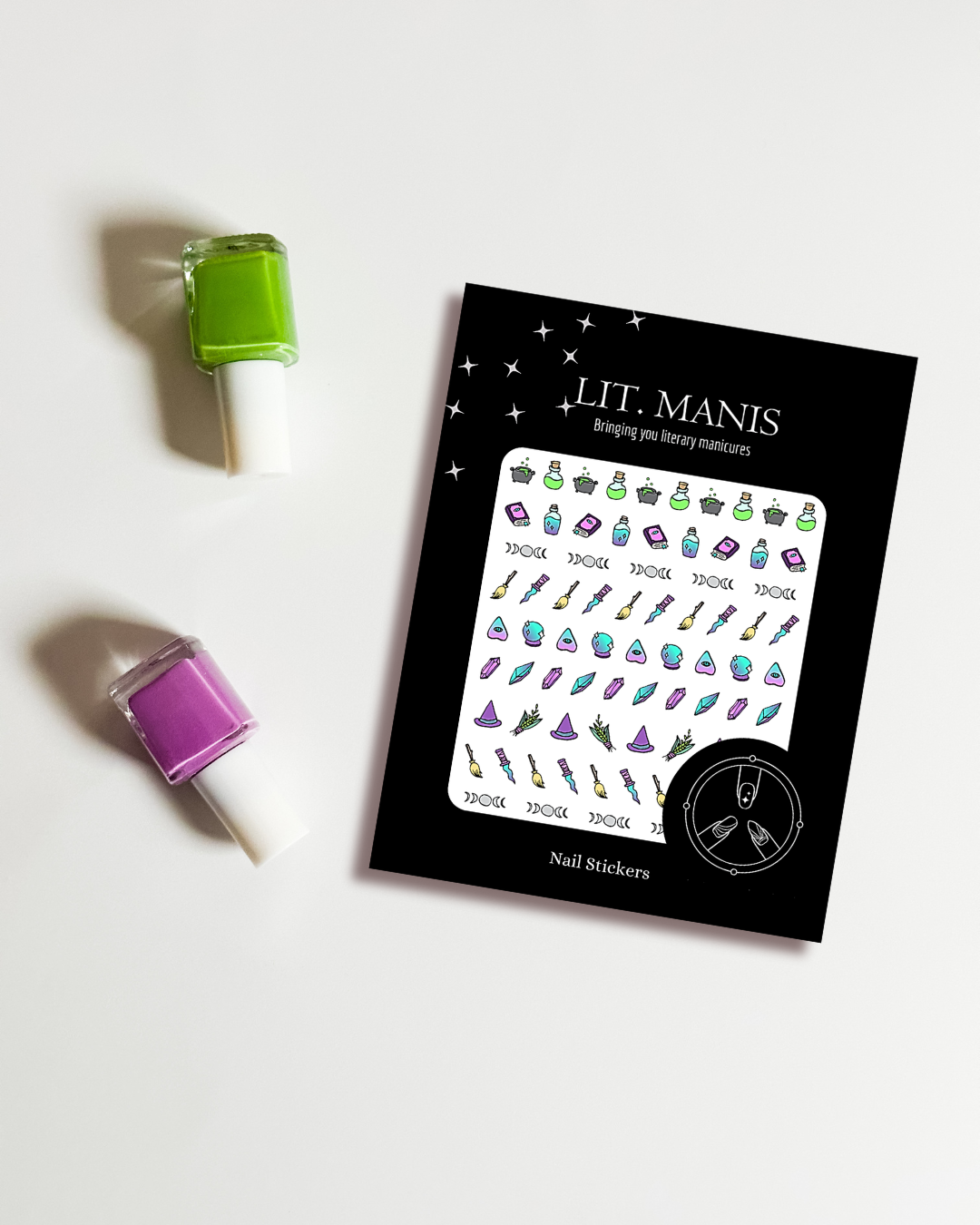 Nail sticker book with 'LIT. MANIS' branding and nail polish bottles on a white background
